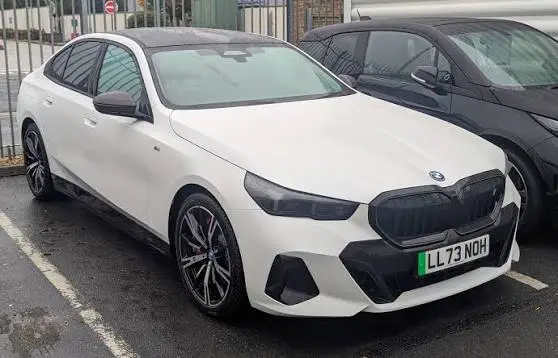 Адаптація та переробка фар BMW i5 G60E США на Євро